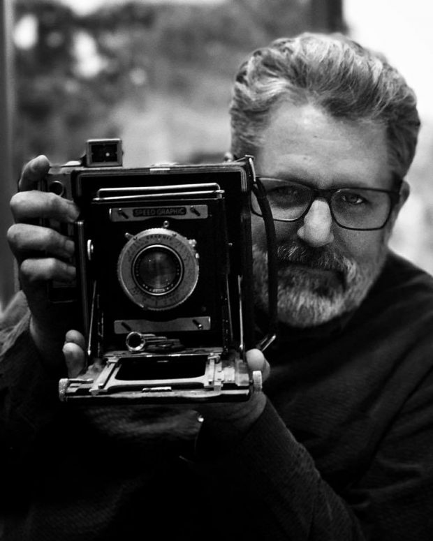 portrait of Joe Gosen with 4x5 Speed Graphic camera